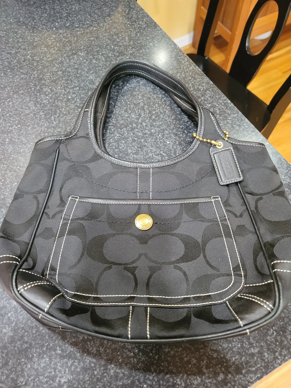 Coach Black Signature Canvas Shoulder Bag with Gold-Tone Accent